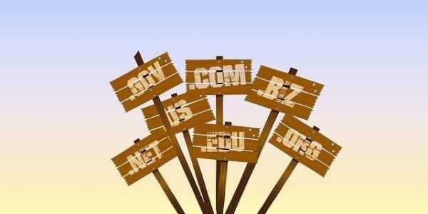 Image of popular domain name extensions being stacked together